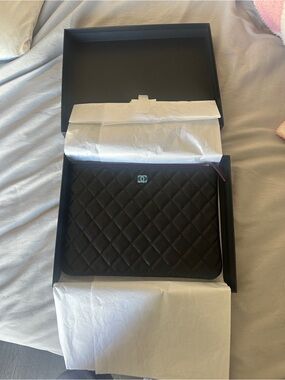 CHANEL Black Quilted Leather Zip Pouch with Silver Logo